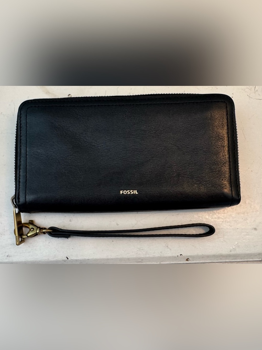Fossil Black Leather Zip-Around Wristlet with Brass Hardware